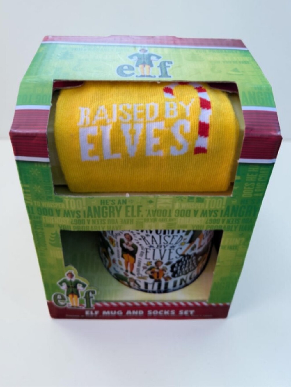 Paladone Elf -Raised By Elves- Yellow Men’s Socks & Mug  (Holiday Gift Set)